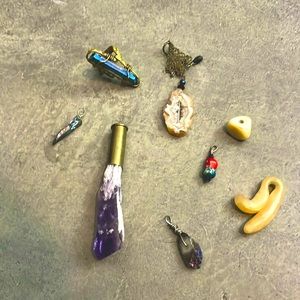 Handmade ring and necklace pendants.